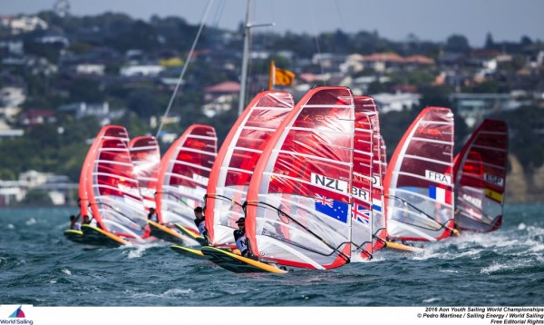 A group of small sail boats racing on the water