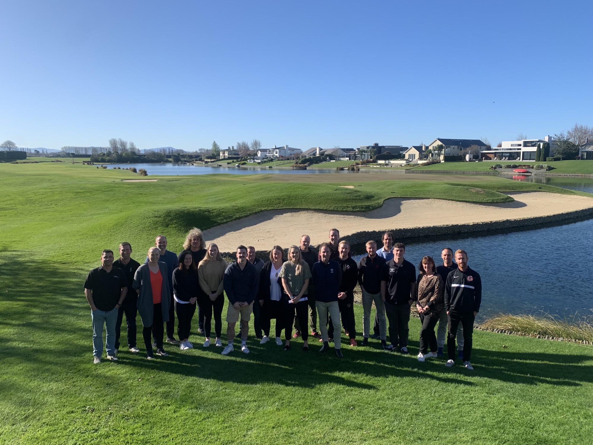 Group of people on a golfing green