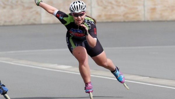 Female speed skater in action