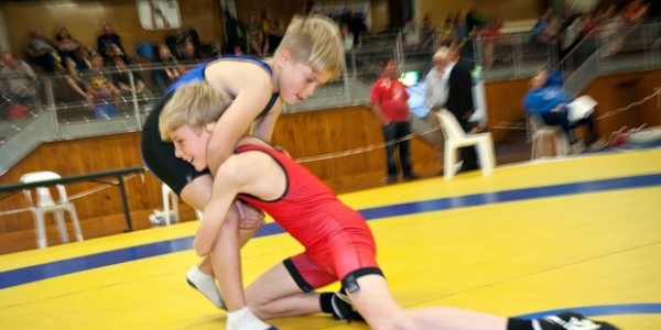 Two boys wrestling