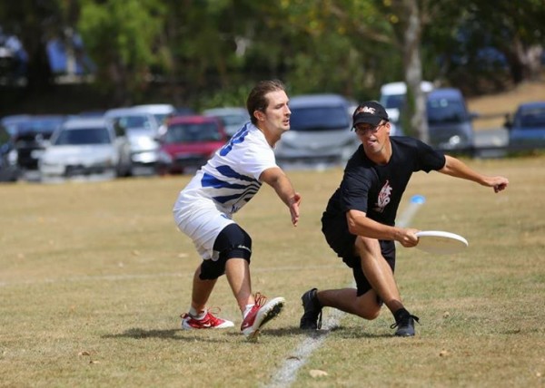 Two players playing Ultimate Frisbee