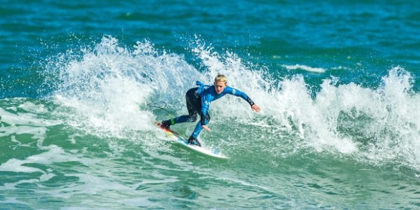 Young woman surfing