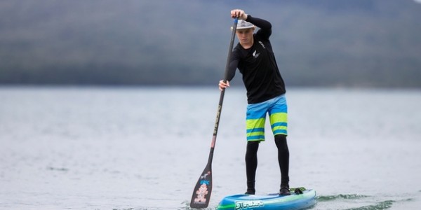 A paddleboarder out on the ocean