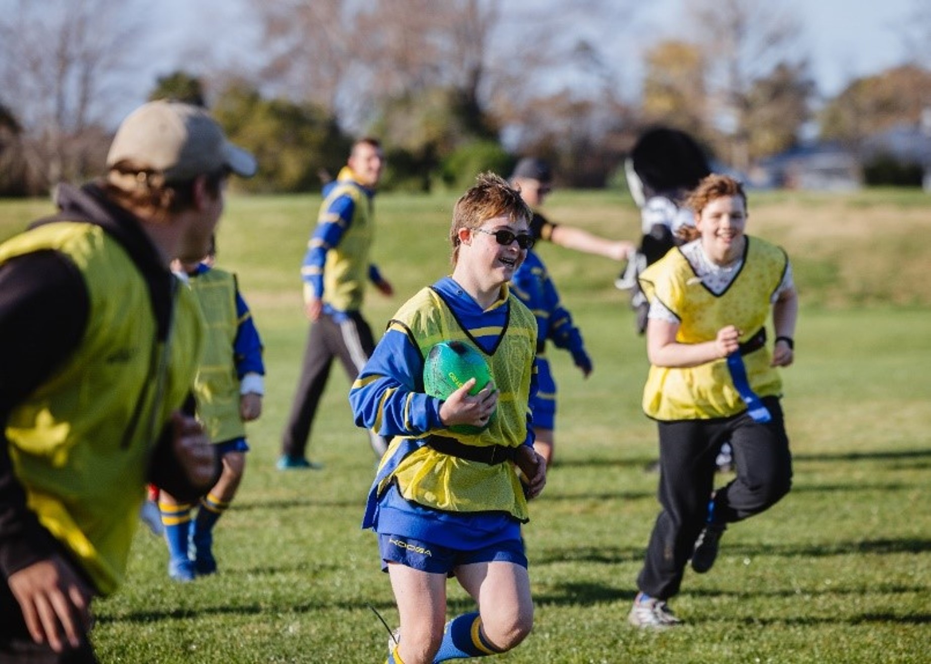 Tamariki running a cross country race