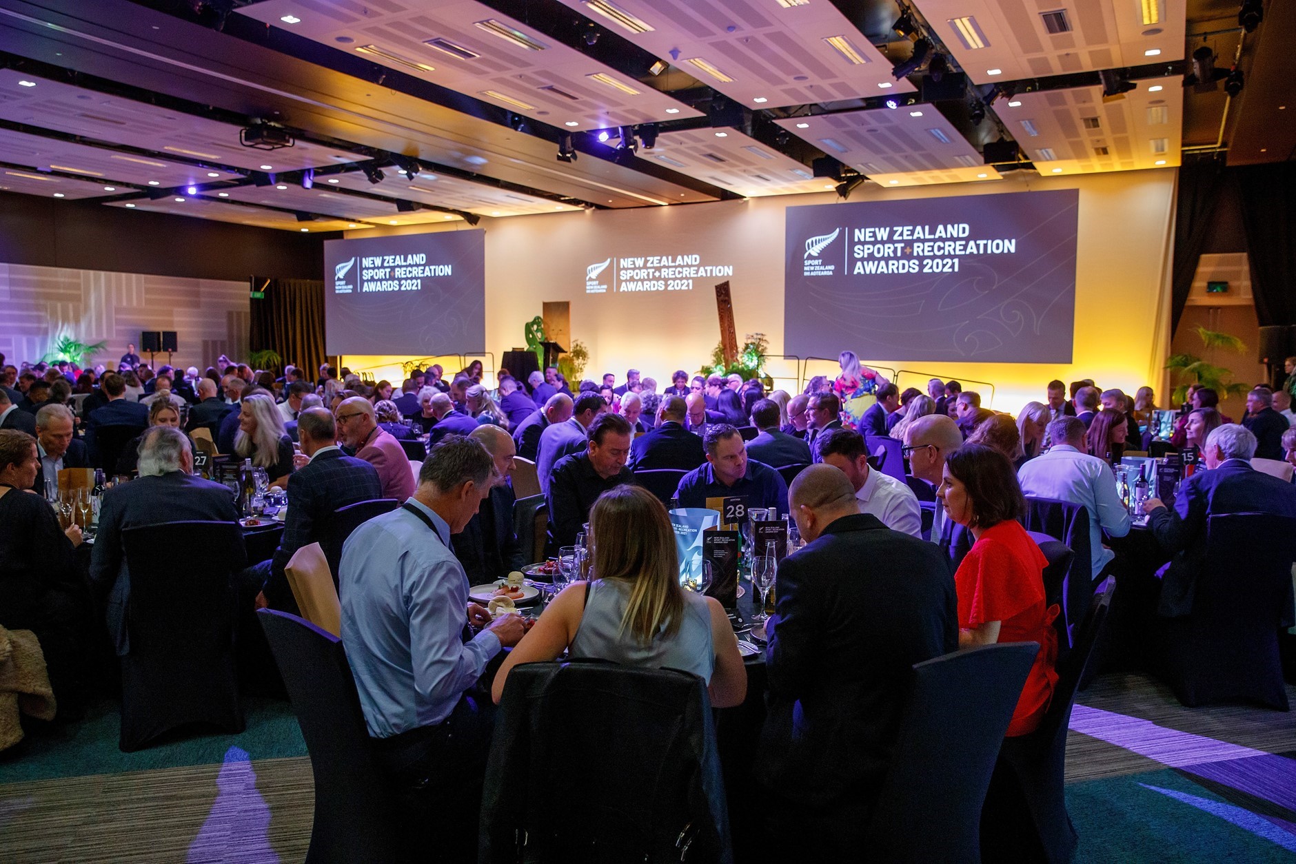 People sitting at round tables at sport and rec awards 2021