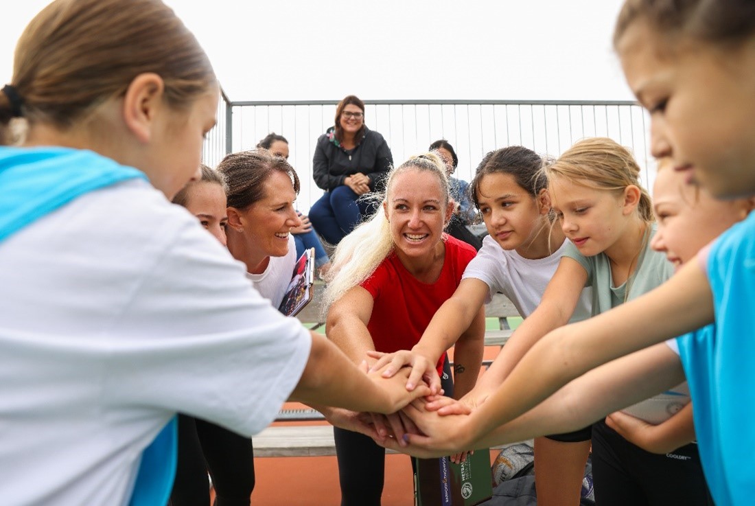 Group of young women playing netball