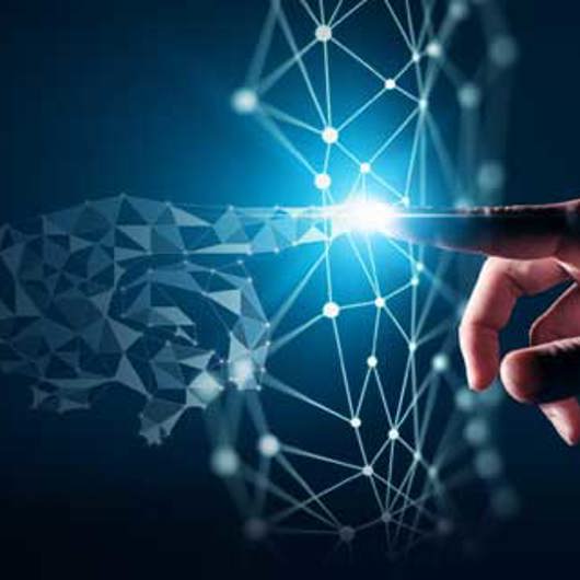 A hand pointing at a mirrored but digital version of itself