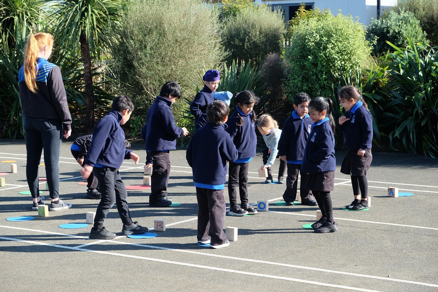 kids playing on a court during PE class