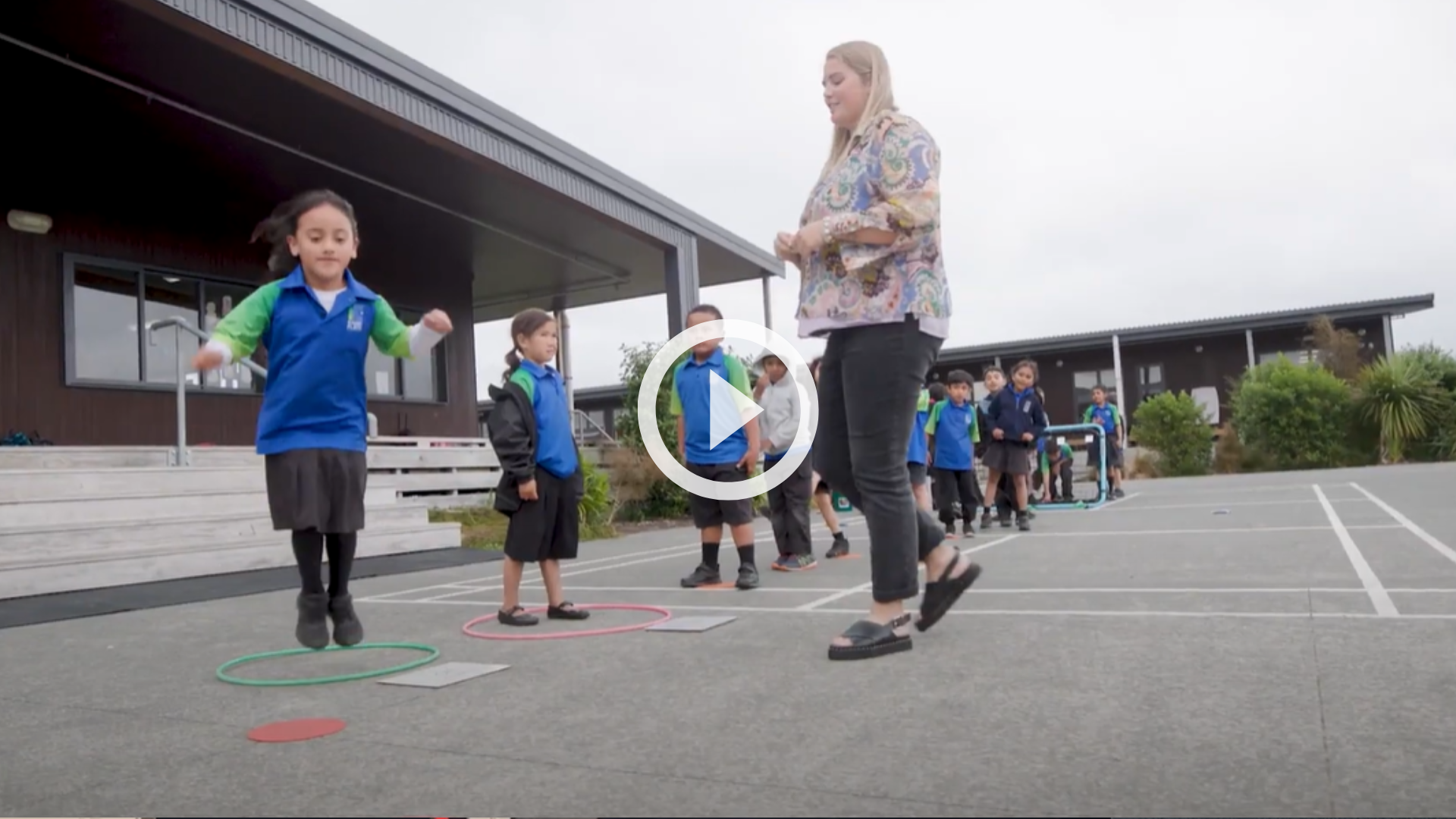 Tamariki playing on a school court