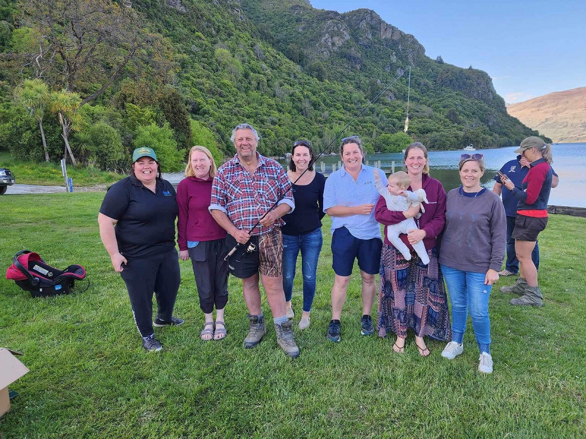 Group of people standing in a field