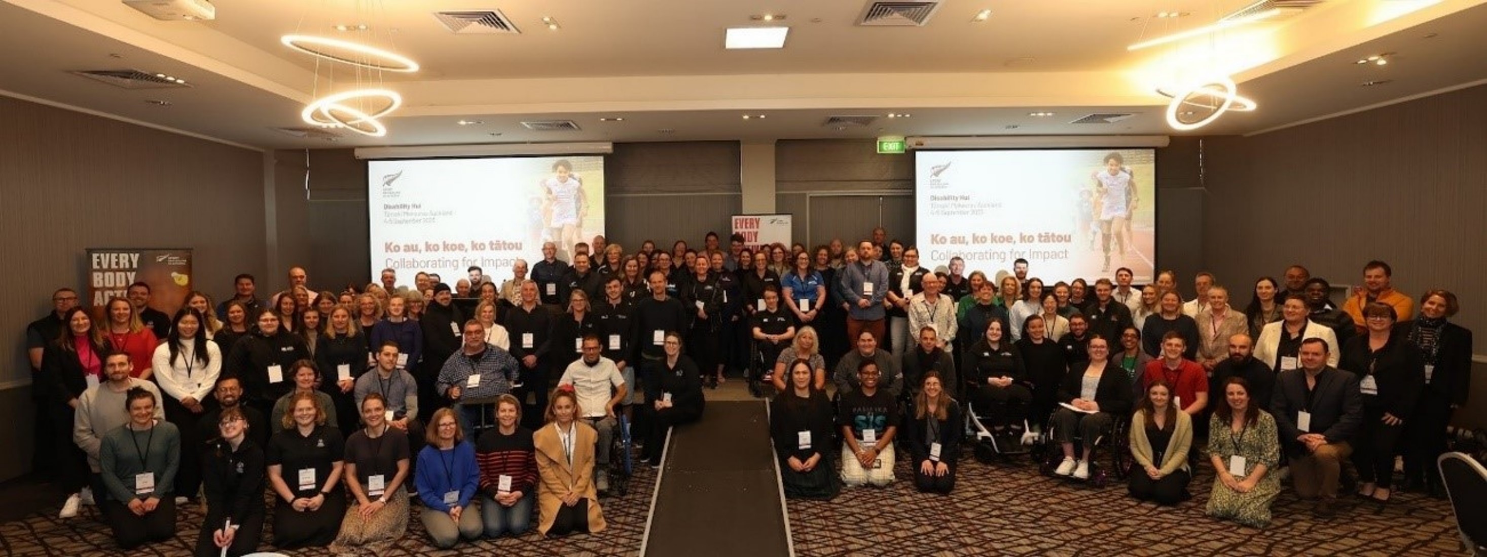 Group looking to camera at the disability hui